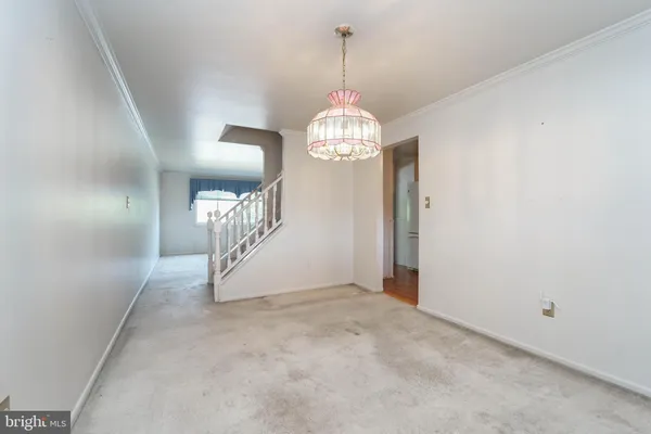 a view of a chandelier in a room