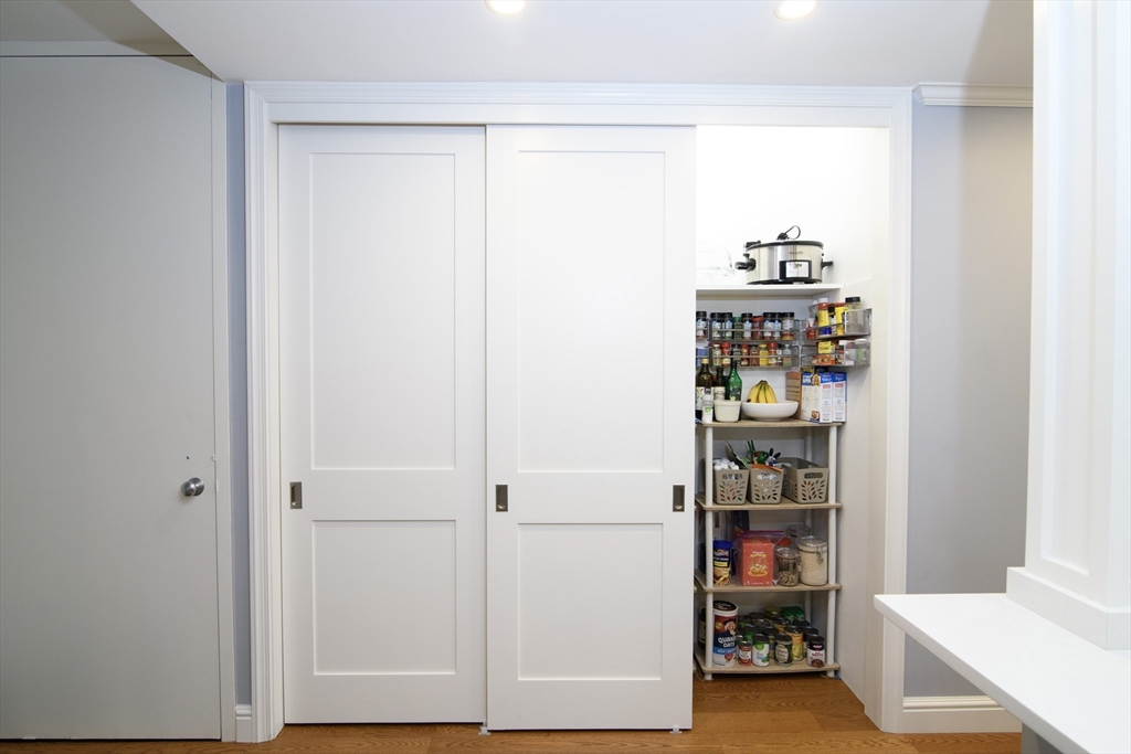 65 East India Row, Unit 9C Boston, MA 02110 - Photo 26 of 40 a view of kitchen and utility room