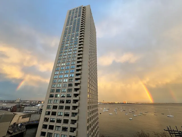 a view of a table and chairs in the garden