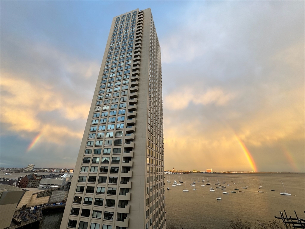 65 East India Row, Unit 9C Boston, MA 02110 - Photo 31 of 40 a city view with tall buildings