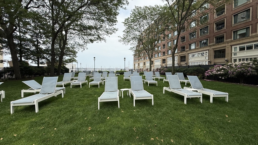 65 East India Row, Unit 9C Boston, MA 02110 - Photo 35 of 40 a view of a chairs in backyard of house