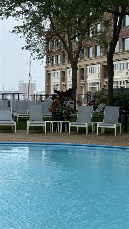 65 East India Row, Unit 9C Boston, MA 02110 - Photo 36 of 40 a view of a house with backyard porch and sitting area