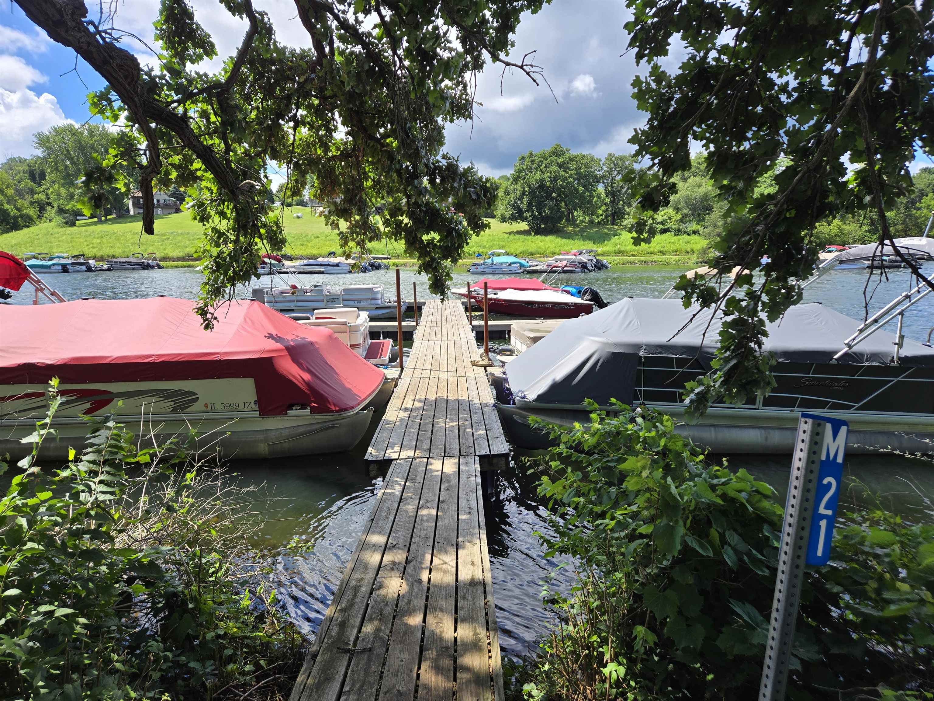 2-a34 Hidden Spring Lane Apple River, IL 61001 - Photo 3 of 5 a view of yard from deck having patio