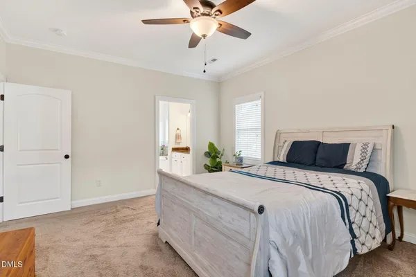 a bathroom with a sink a vanity a mirror and a bathtub