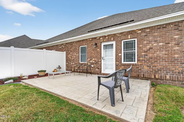 a view of a yard in front of a house with a yard