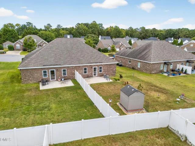 a view of a house with swimming pool
