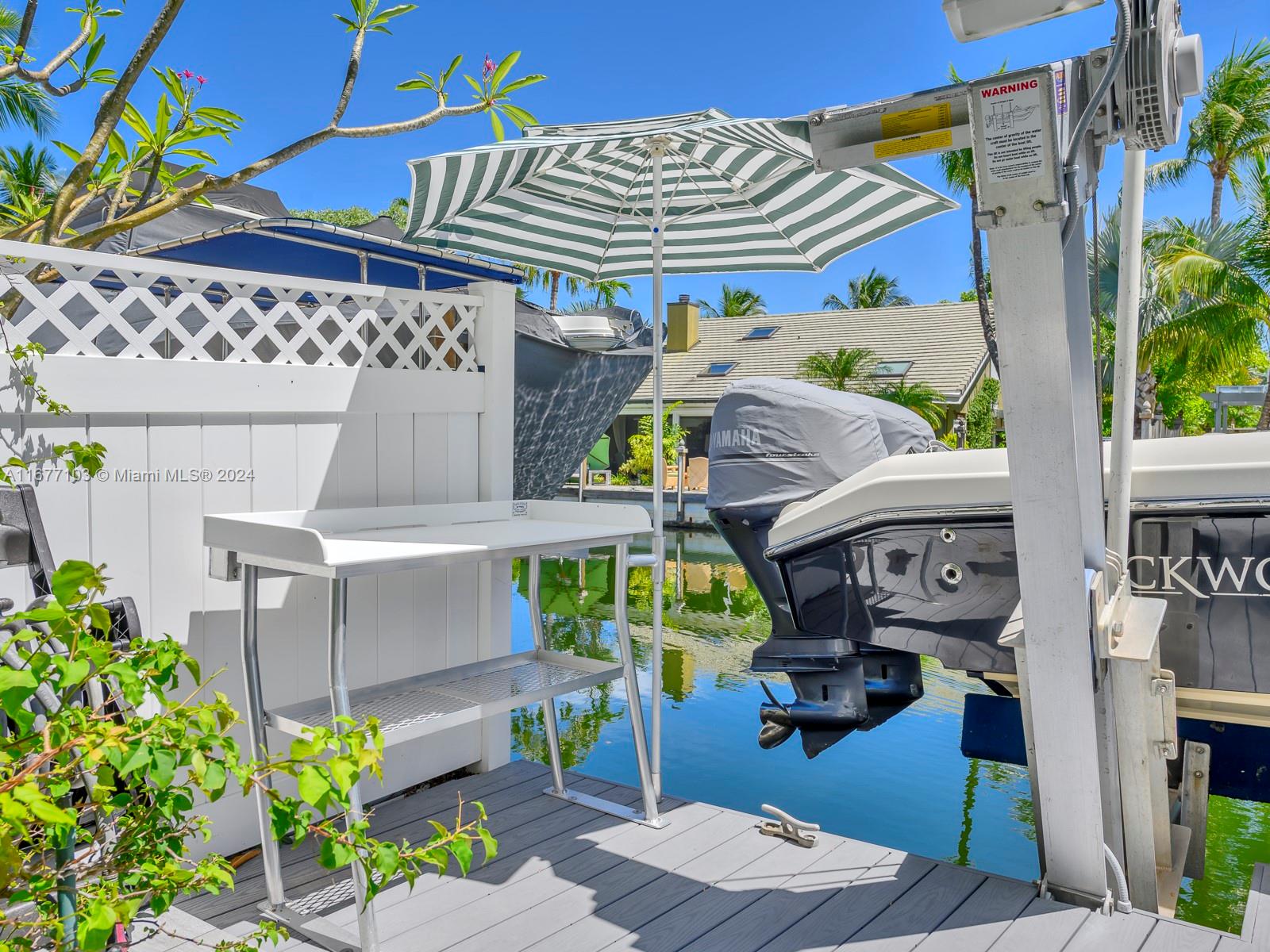 3 North Drive Key Largo, FL 33037 - Photo 12 of 54 a front view of the house with outdoor seating