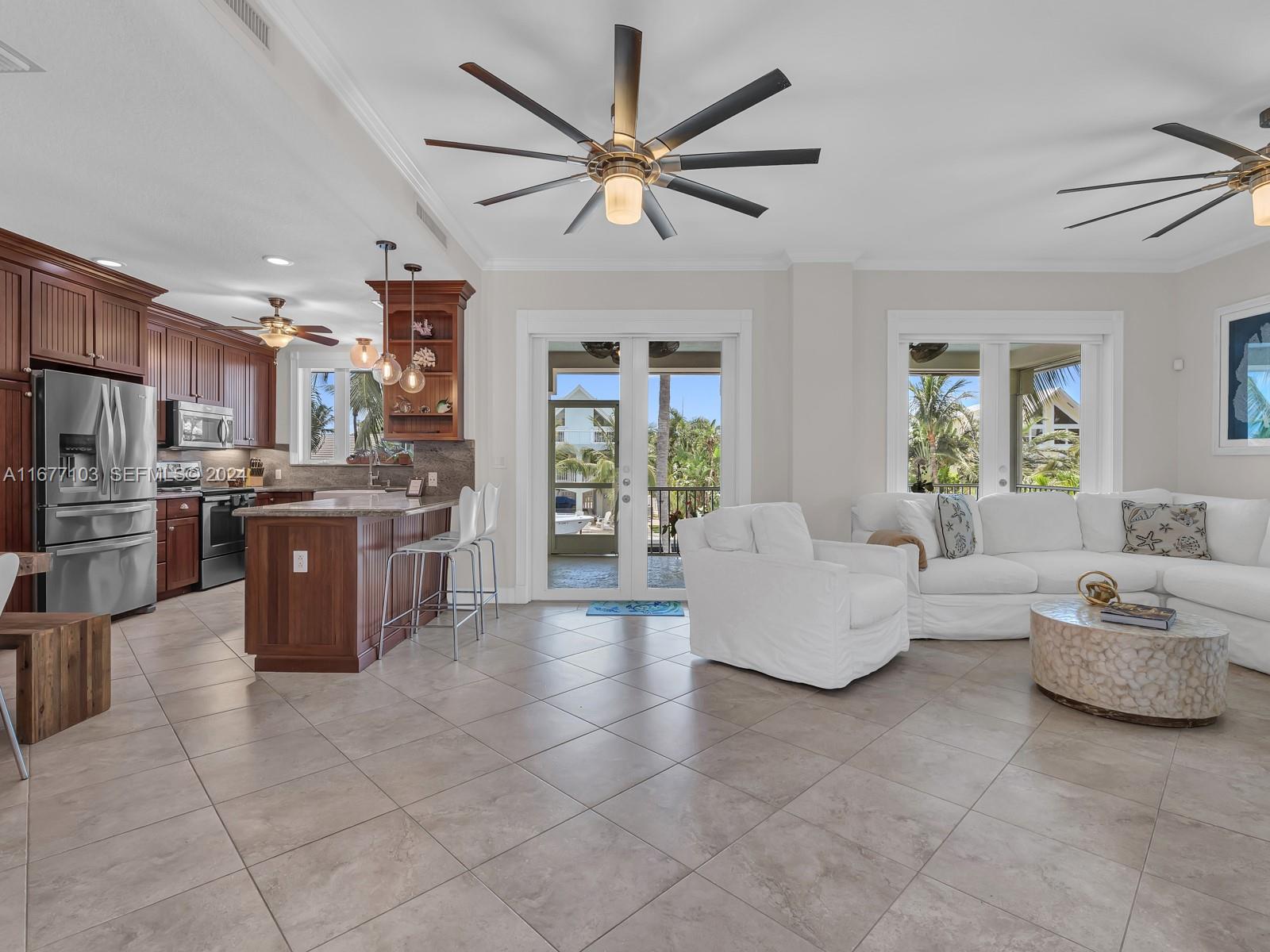 3 North Drive Key Largo, FL 33037 - Photo 16 of 54 a living room with furniture and kitchen view
