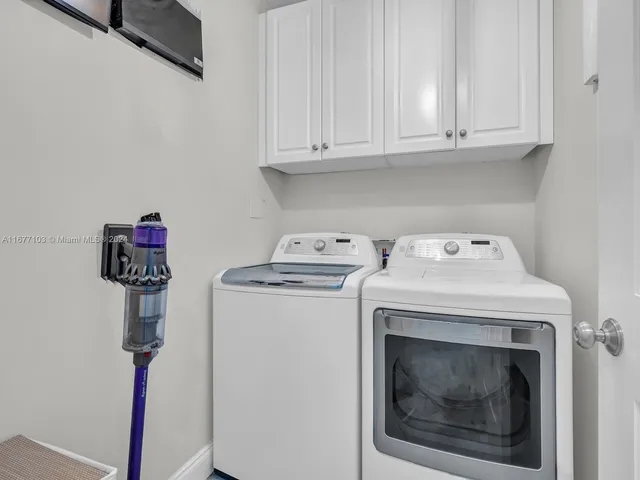 a bed room with a bed and a window