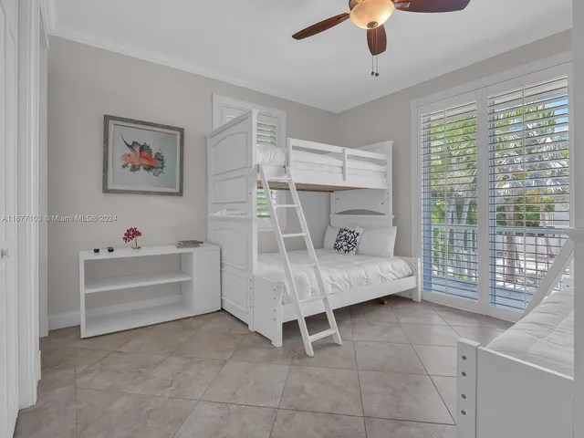a bathroom with a granite countertop sink mirror and shower