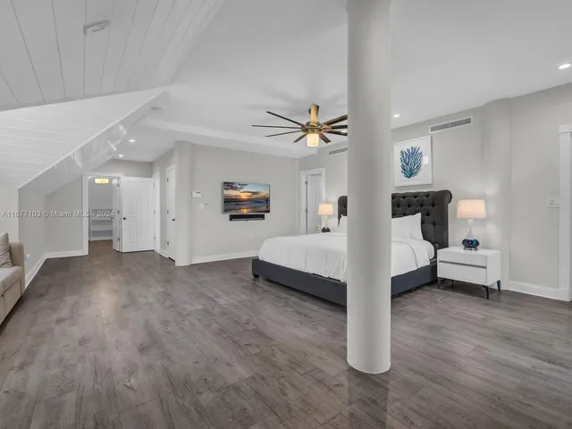 a view of a chairs and table in the balcony