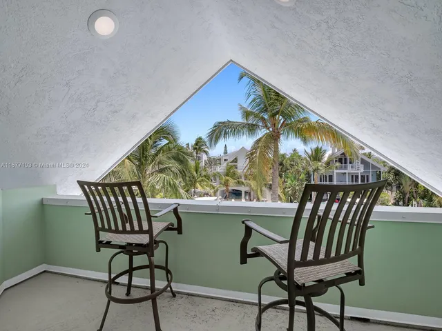 a bathroom with a granite countertop sink a toilet and bathtub