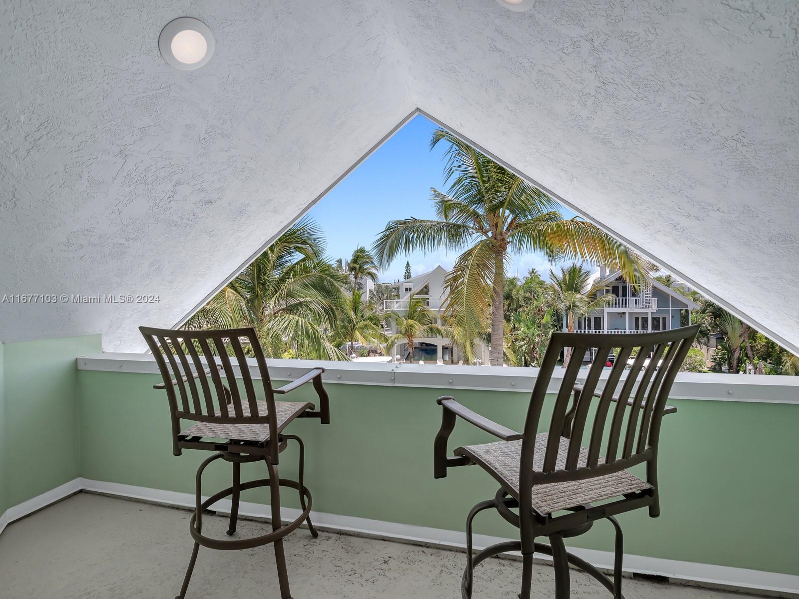 3 North Drive Key Largo, FL 33037 - Photo 39 of 54 a view of a chairs and table in the balcony