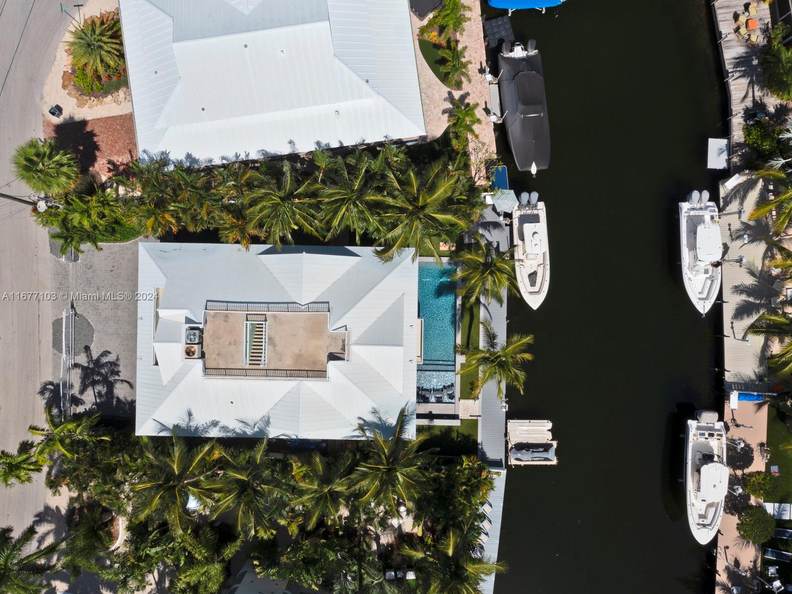 3 North Drive Key Largo, FL 33037 - Photo 4 of 54 an aerial view of a house
