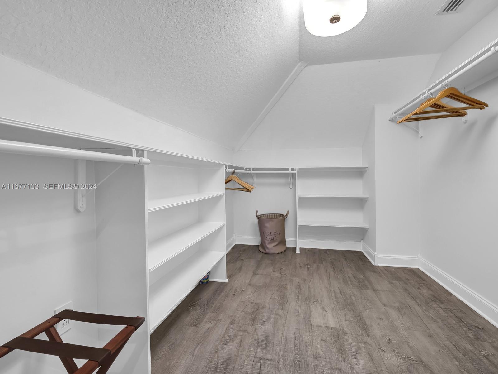 3 North Drive Key Largo, FL 33037 - Photo 41 of 54 a view of a room with rack on the wall