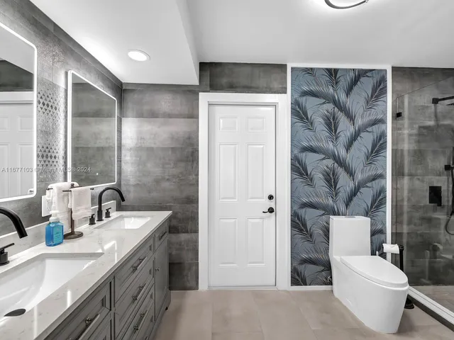 a view of a backyard with a patio and swimming pool