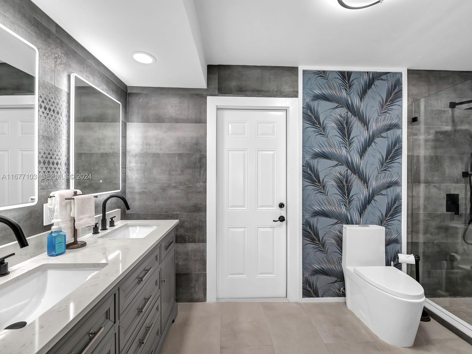 3 North Drive Key Largo, FL 33037 - Photo 46 of 54 a bathroom with a double vanity sink toilet and shower