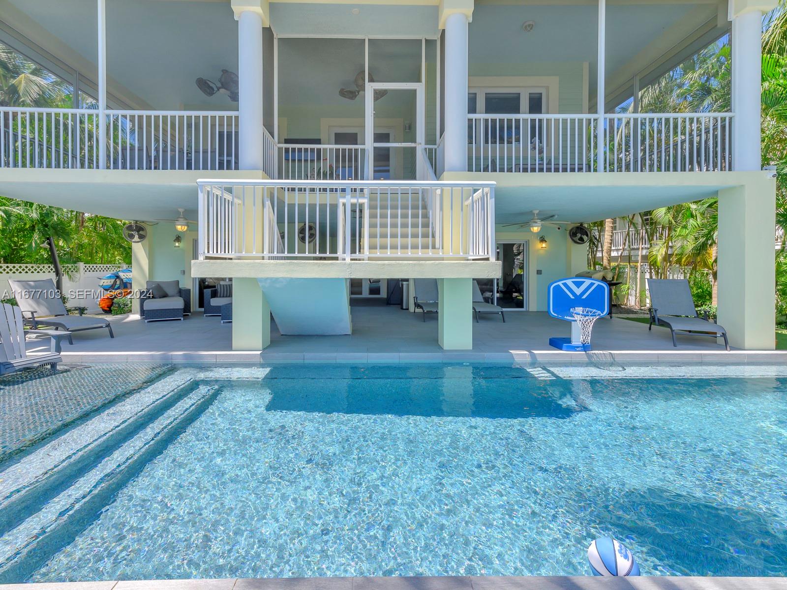 3 North Drive Key Largo, FL 33037 - Photo 50 of 54 a view of a deck with barbeque grill wooden floor and bench