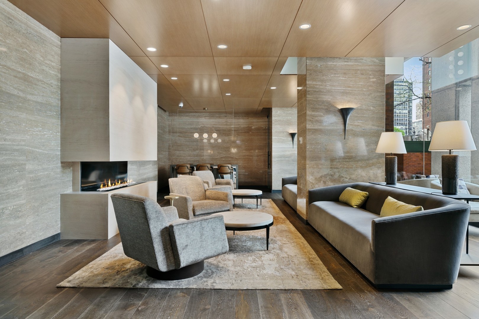 1030 North State Street, Unit 13E Chicago, IL 60610 - Photo 26 of 30 a living room with couches and a view of kitchen