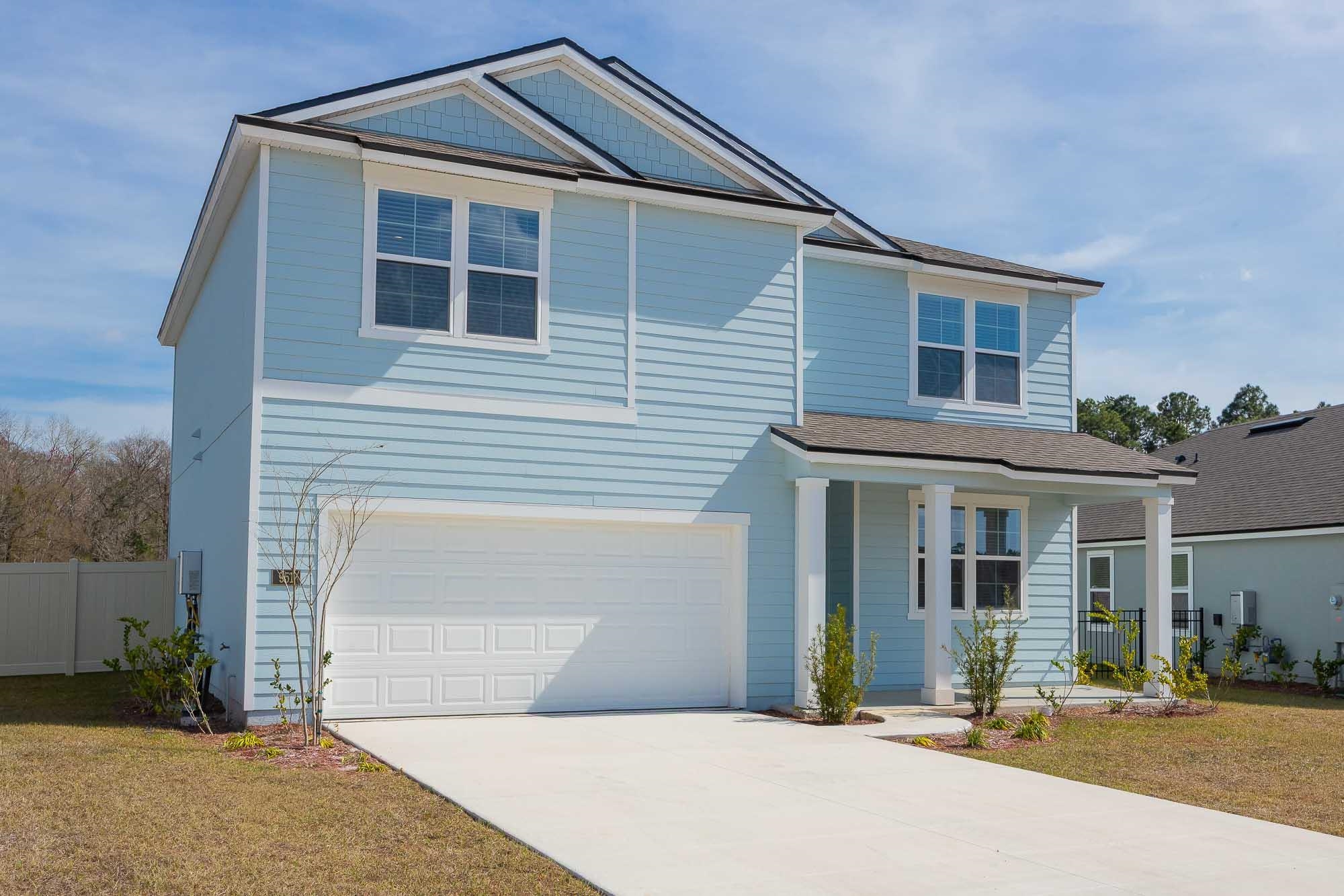 951 Orellana Road St. Augustine, FL 32084 - Photo 27 of 54 a front view of a house with a yard