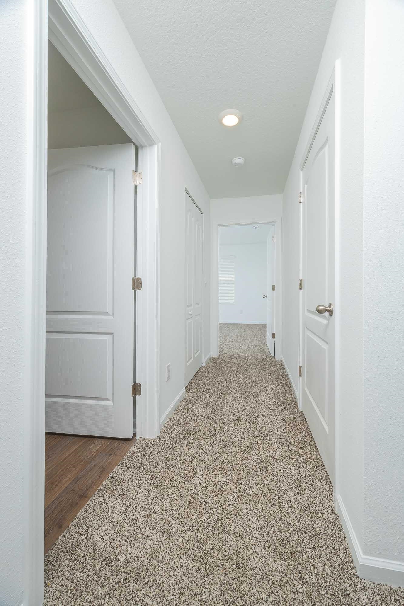 951 Orellana Road St. Augustine, FL 32084 - Photo 49 of 54 a view of a big room with closet and wooden floor