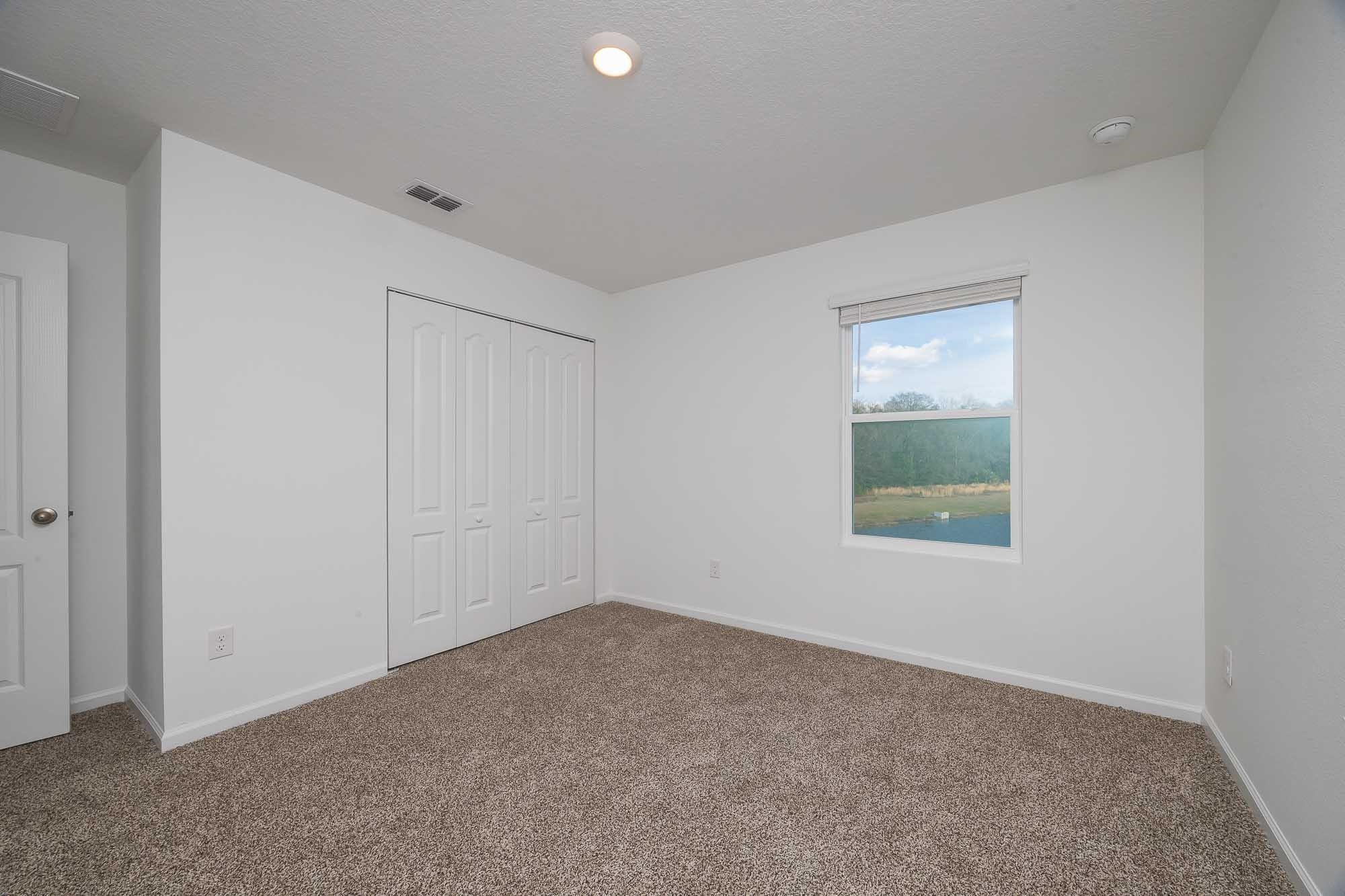 951 Orellana Road St. Augustine, FL 32084 - Photo 51 of 54 a view of an empty room with a window