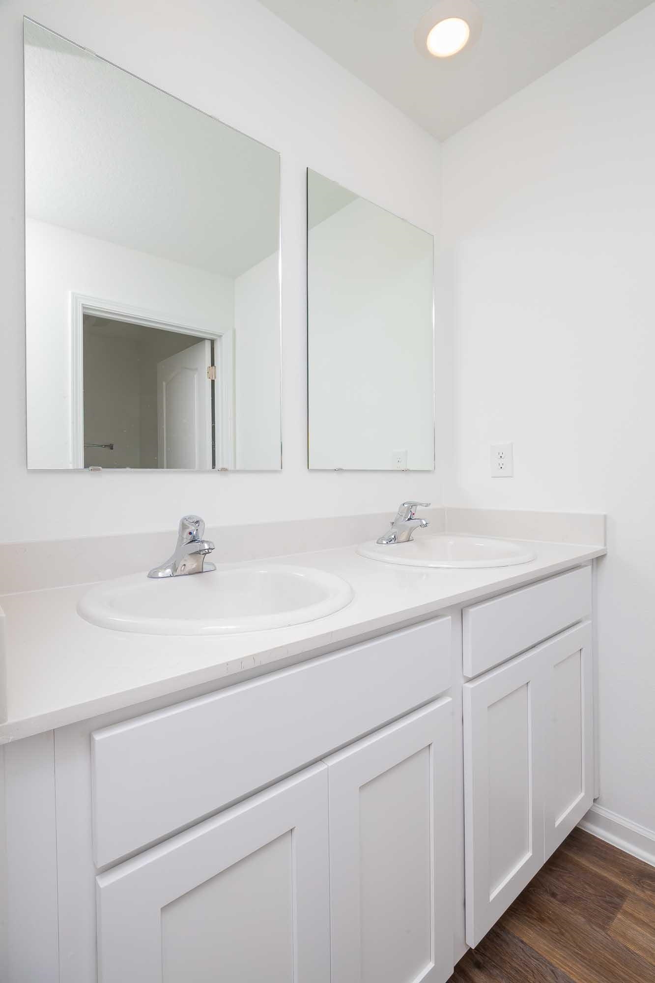 951 Orellana Road St. Augustine, FL 32084 - Photo 52 of 54 a bathroom with a sink and a mirror