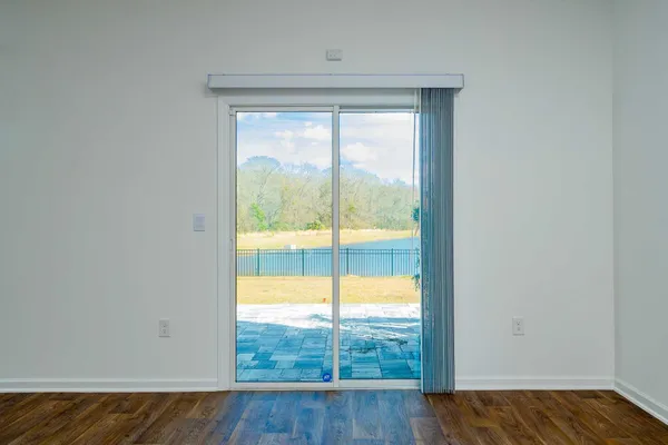 a view of an empty room and window