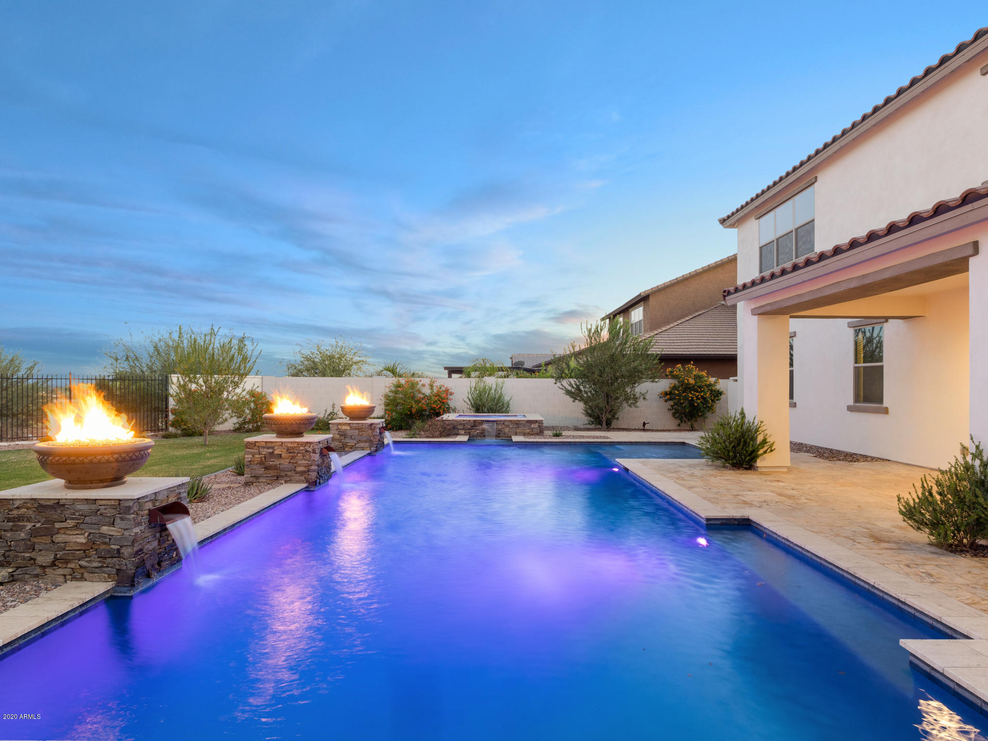 2247 North Beverly Place Buckeye, AZ 85396 - Photo 1 of 95 a view of a swimming pool with lounge chair