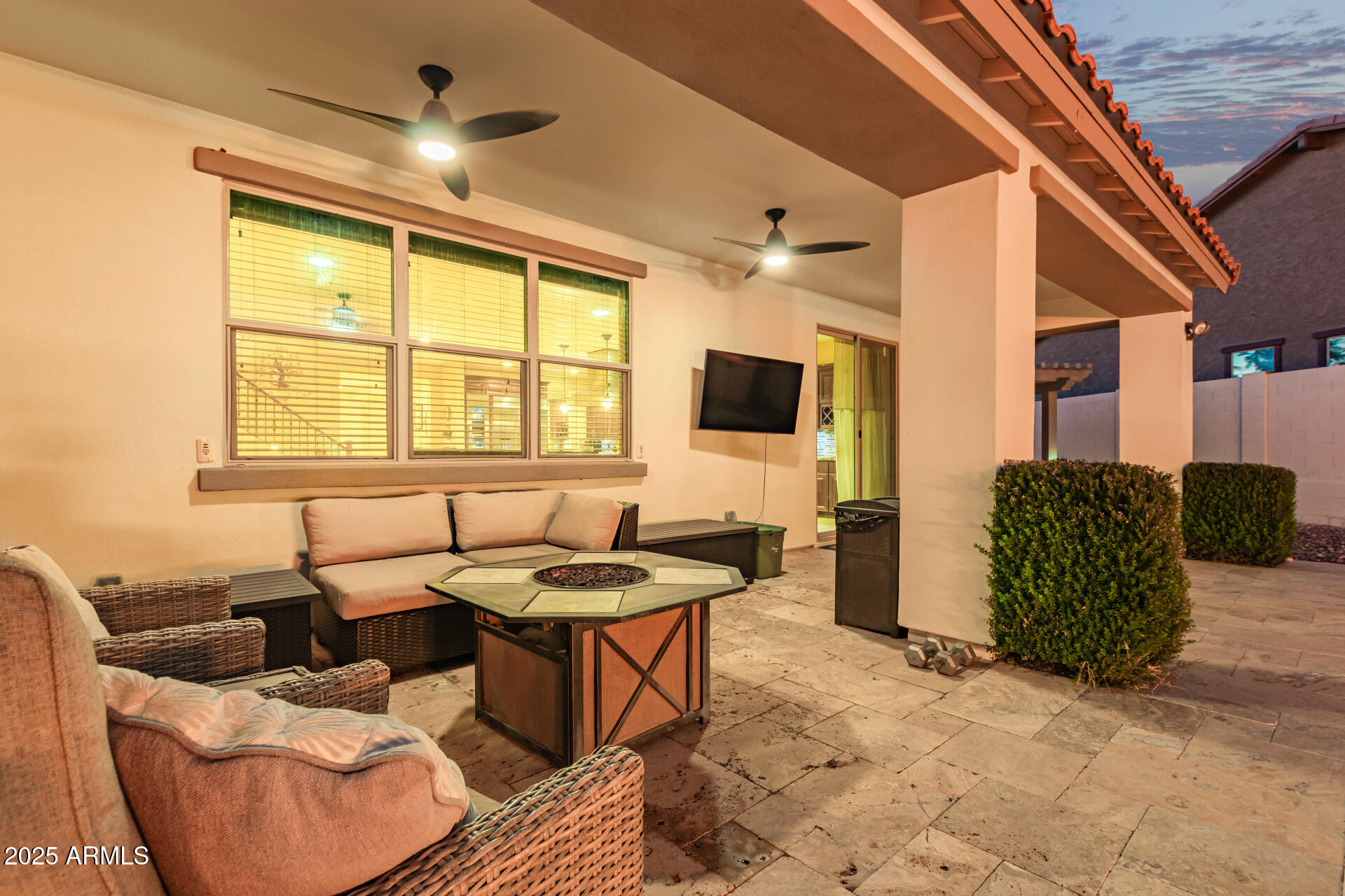 2247 North Beverly Place Buckeye, AZ 85396 - Photo 59 of 95 a living room with furniture and a flat screen tv