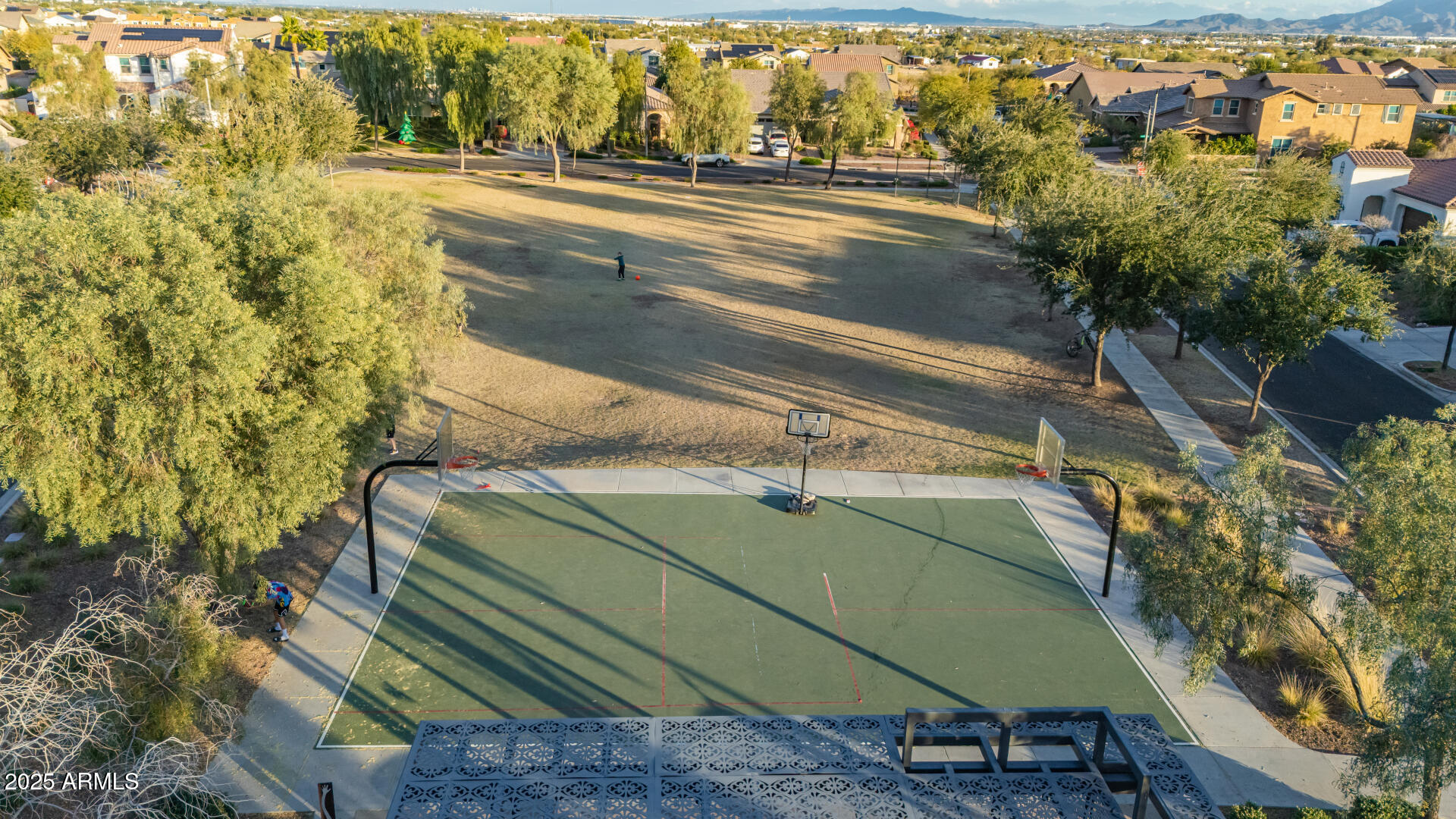 2247 North Beverly Place Buckeye, AZ 85396 - Photo 73 of 95 a aerial view of a house with a yard