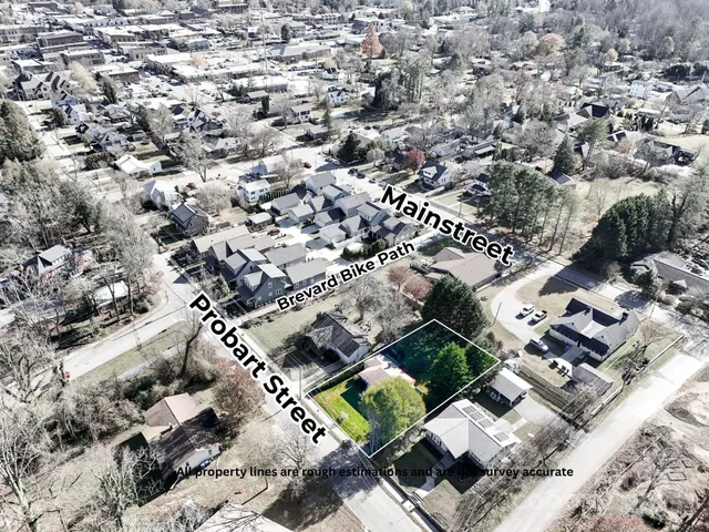 an aerial view of a city with lots of residential buildings