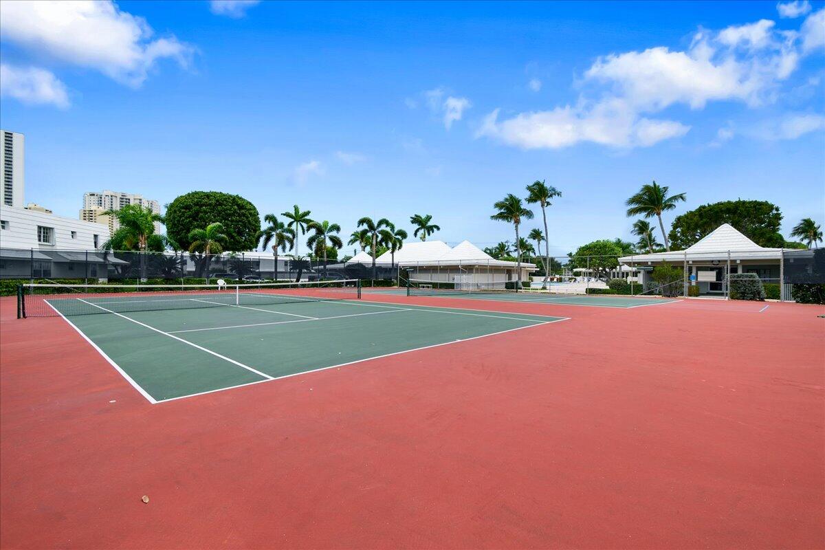 1252 Sugar Sands Boulevard, Unit 137 Riviera Beach, FL 33404 - Photo 34 of 38 a view of a tennis court