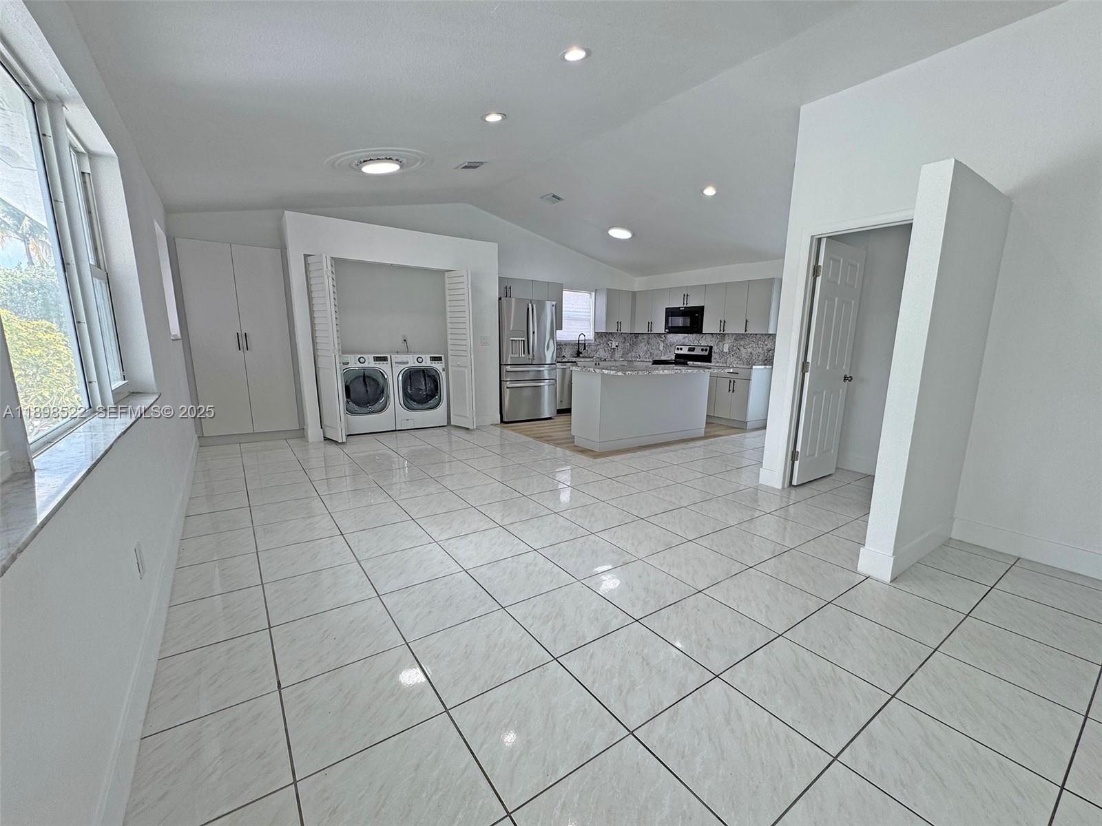 22712 Southwest 113th Place Miami, FL 33170 - Photo 3 of 15 a view of a electric appliances and cabinets in a room