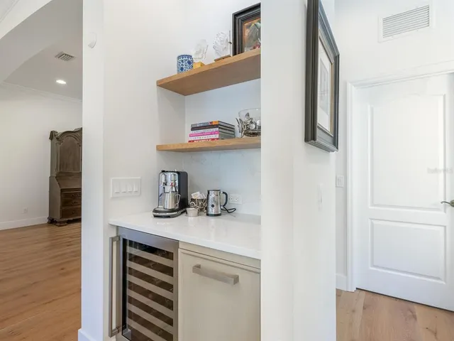 a bathroom with a sink a mirror and a window