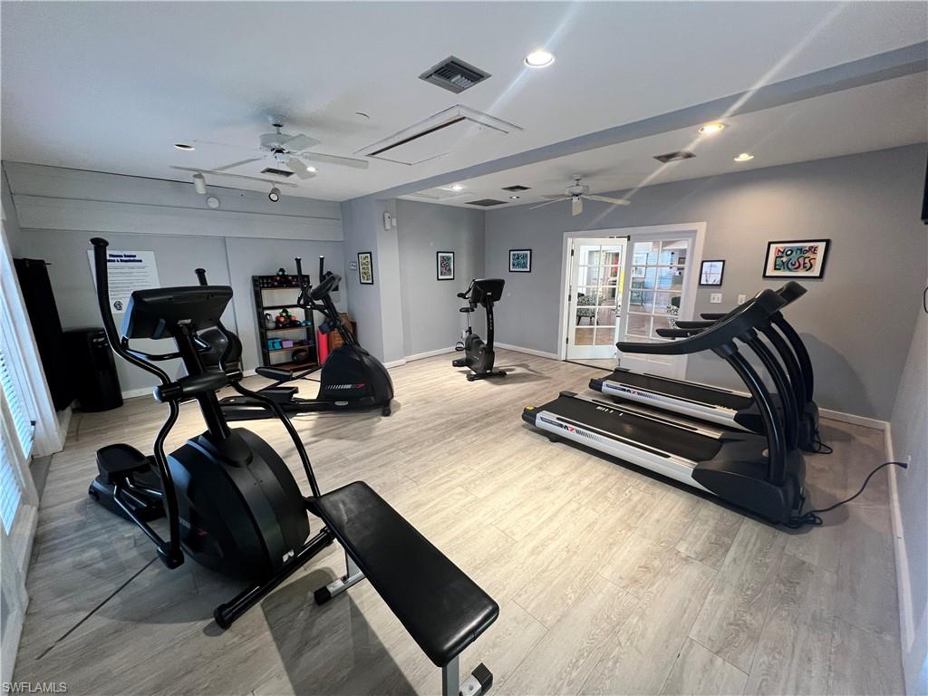 600 Neapolitan Way, Unit 342 Naples, FL 34103 - Photo 37 of 50 a view of a room with gym equipment