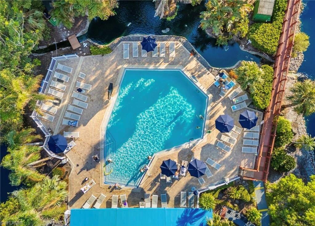 600 Neapolitan Way, Unit 342 Naples, FL 34103 - Photo 47 of 50 an aerial view of residential house with outdoor space and swimming pool