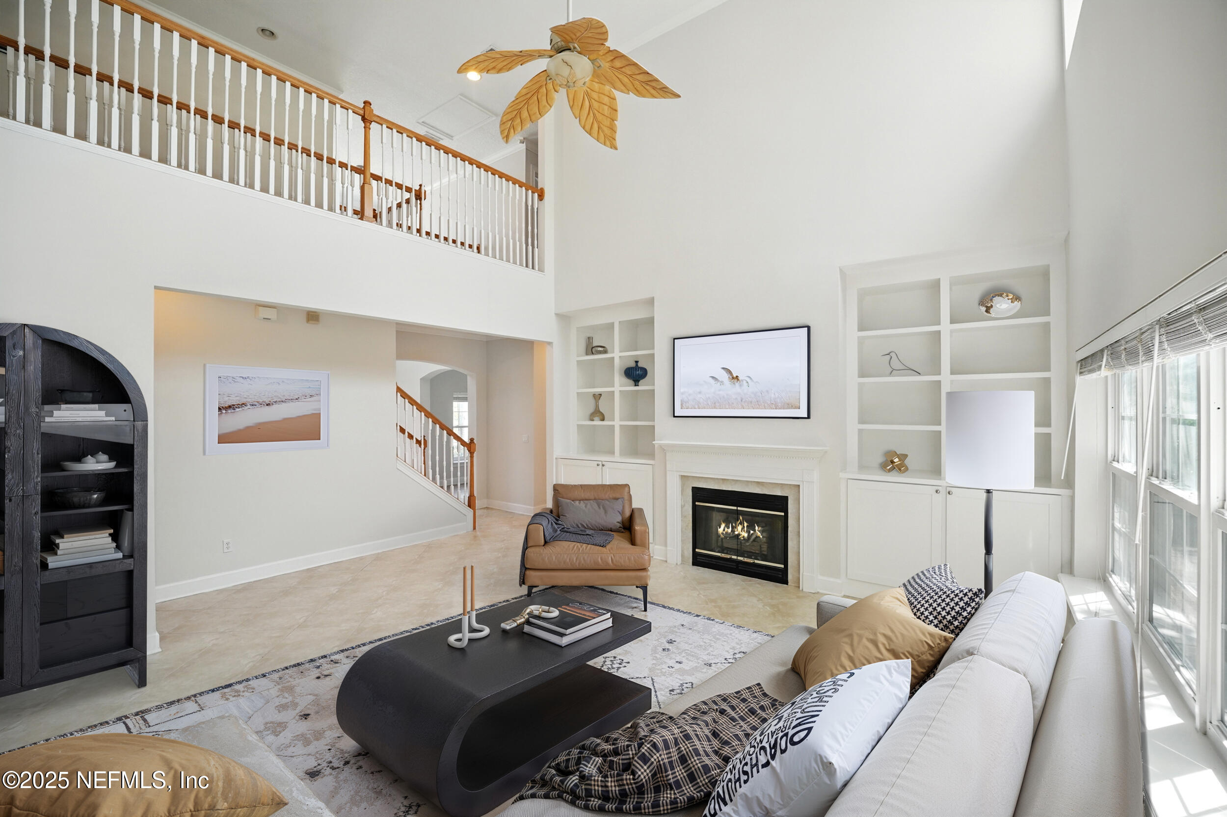 105 2nd Street St. Augustine, FL 32084 - Photo 13 of 61 a living room with furniture and a fireplace
