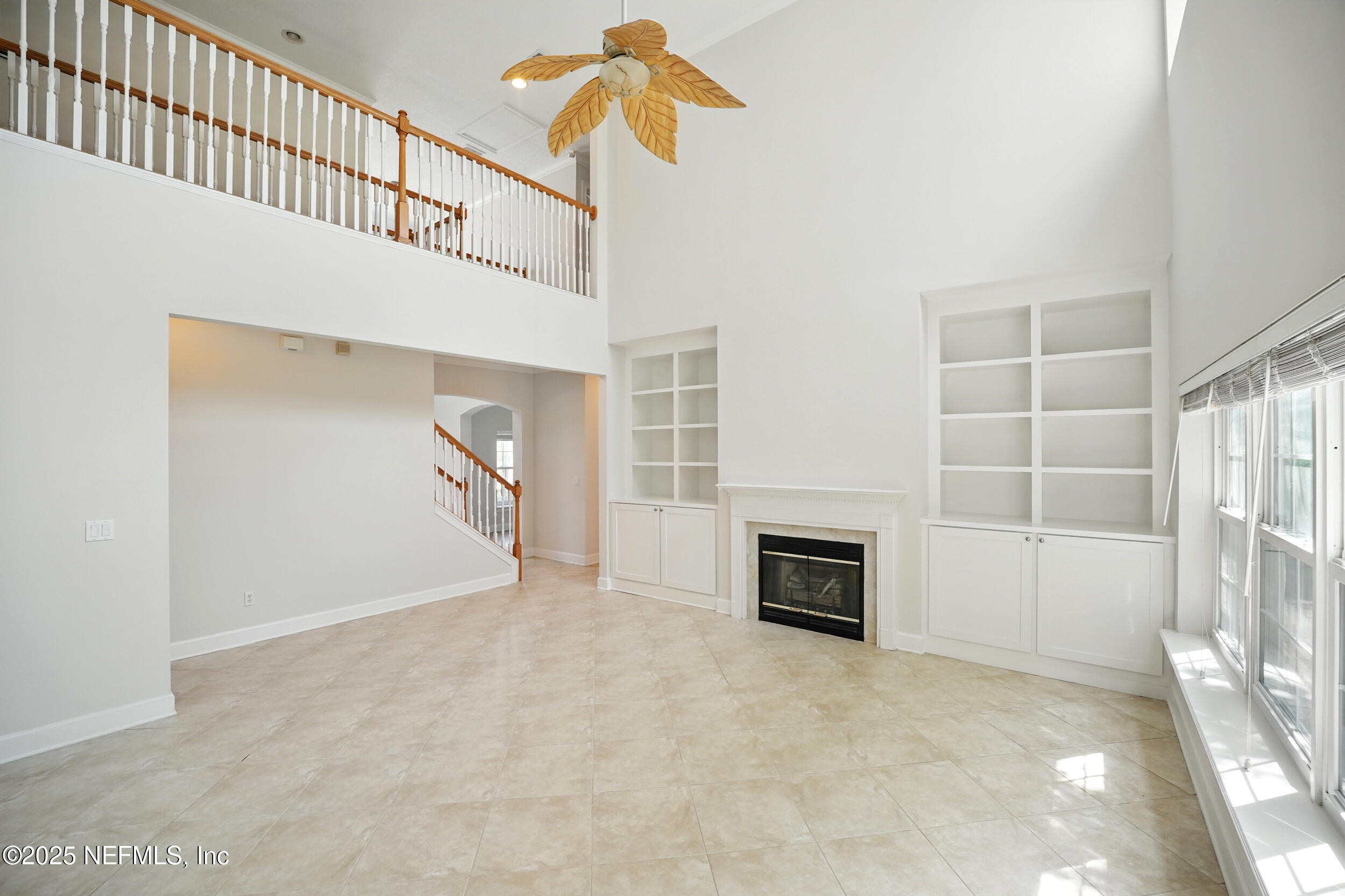 105 2nd Street St. Augustine, FL 32084 - Photo 16 of 61 a view of a livingroom with a fireplace