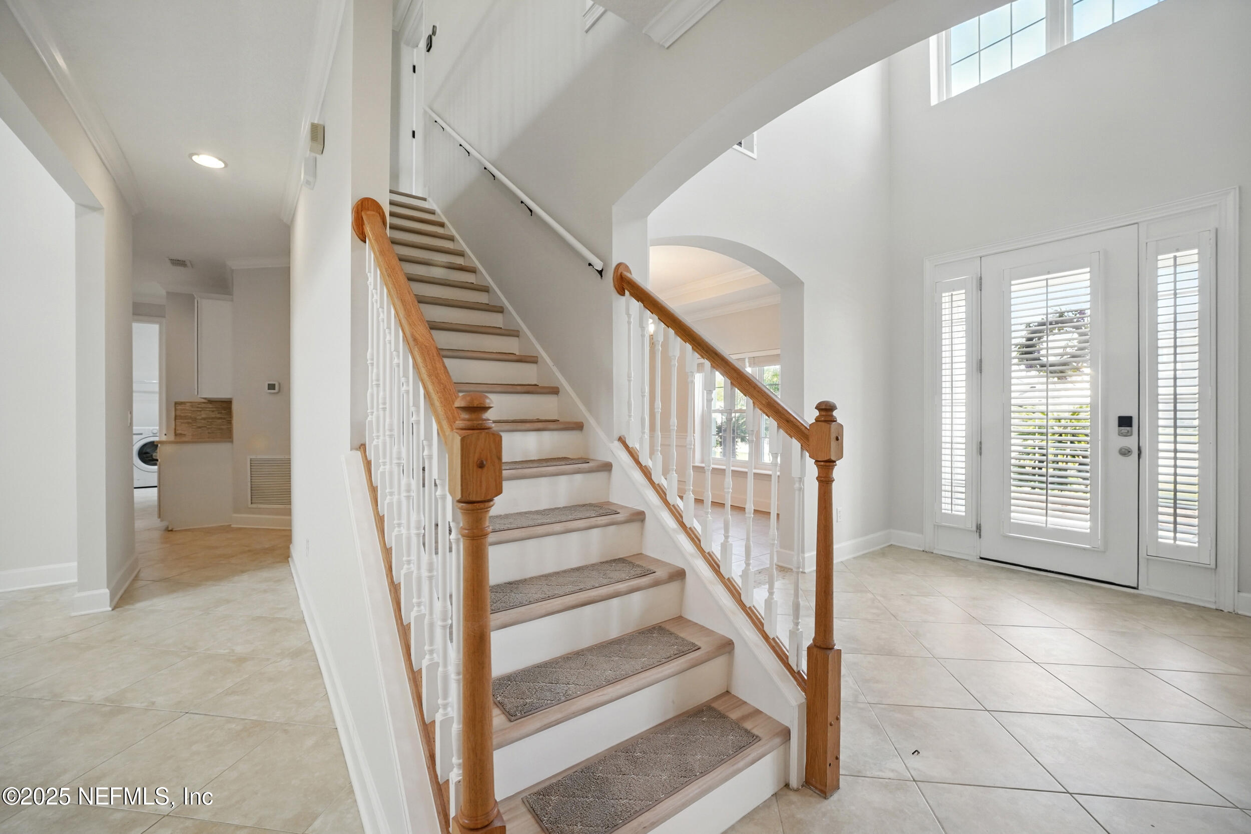 105 2nd Street St. Augustine, FL 32084 - Photo 26 of 61 a view of an entryway with staircase