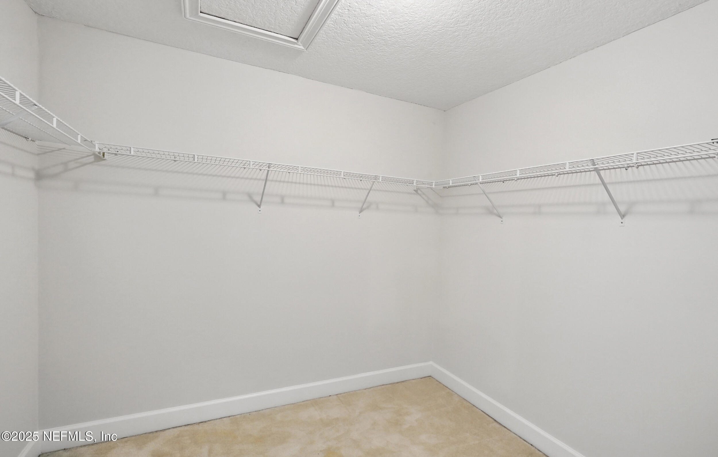 105 2nd Street St. Augustine, FL 32084 - Photo 35 of 61 a view of a room with racks on the wall