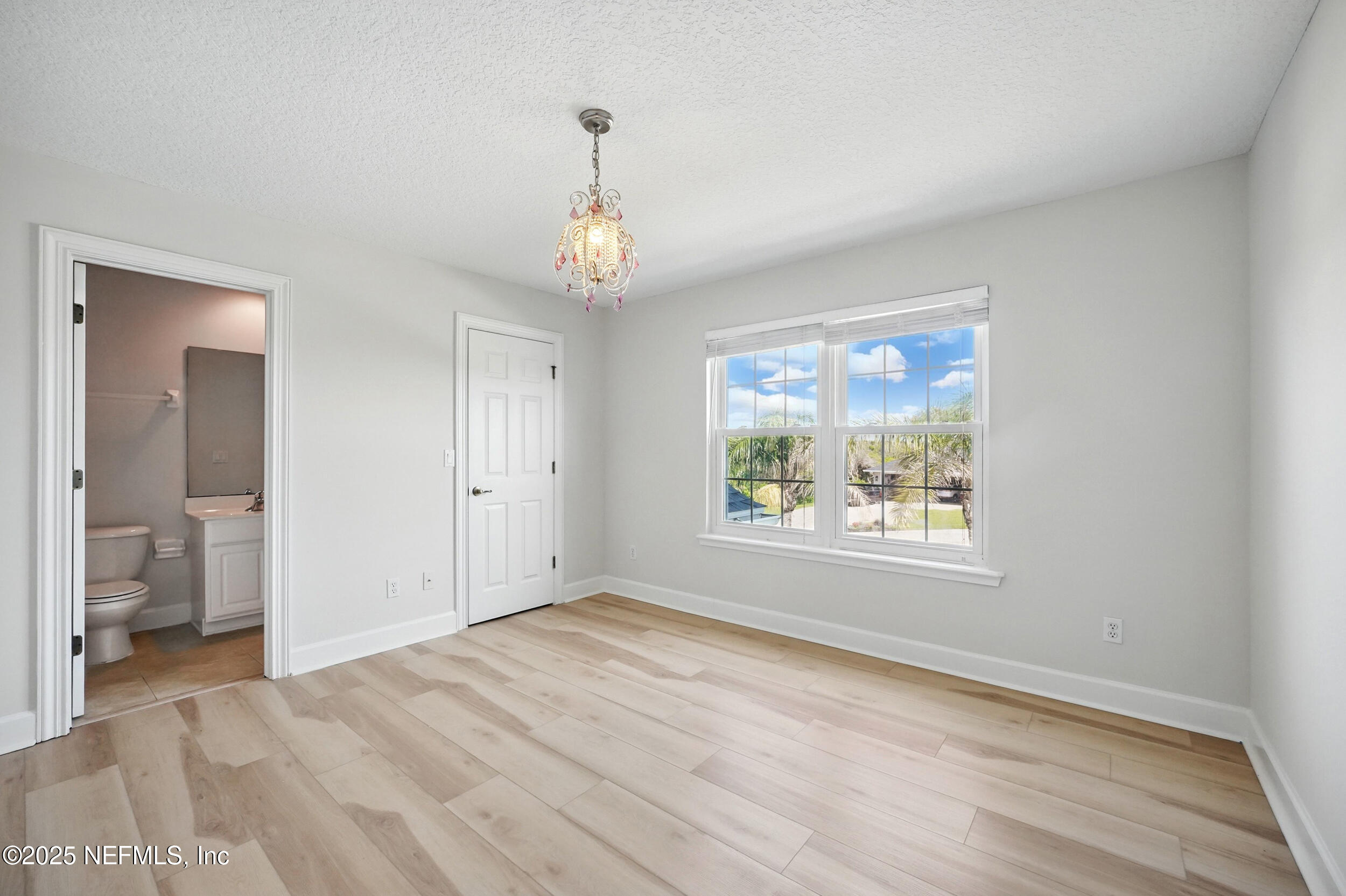105 2nd Street St. Augustine, FL 32084 - Photo 40 of 61 a view of an empty room with a window
