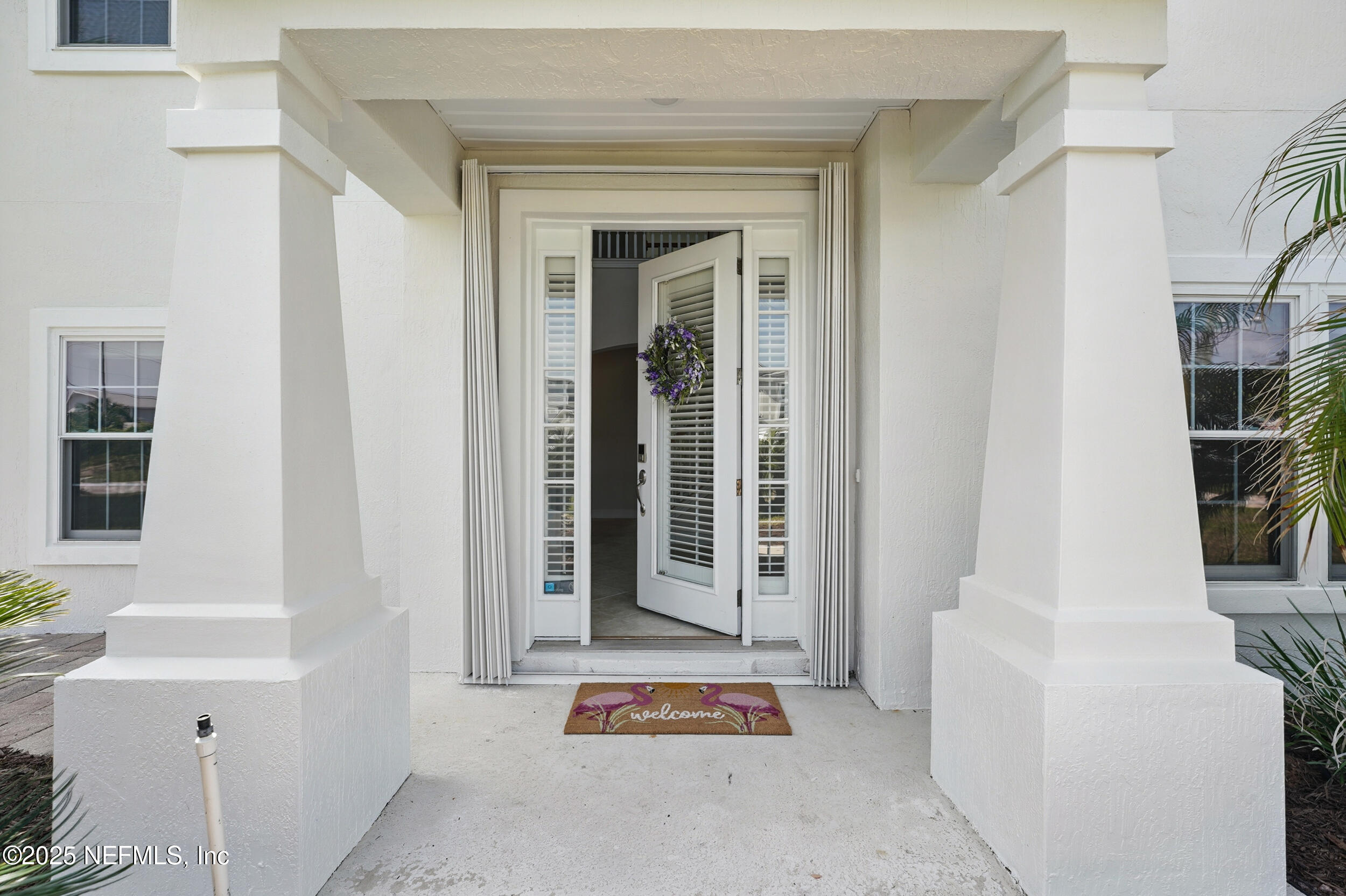 105 2nd Street St. Augustine, FL 32084 - Photo 4 of 61 a view of front door with glass door