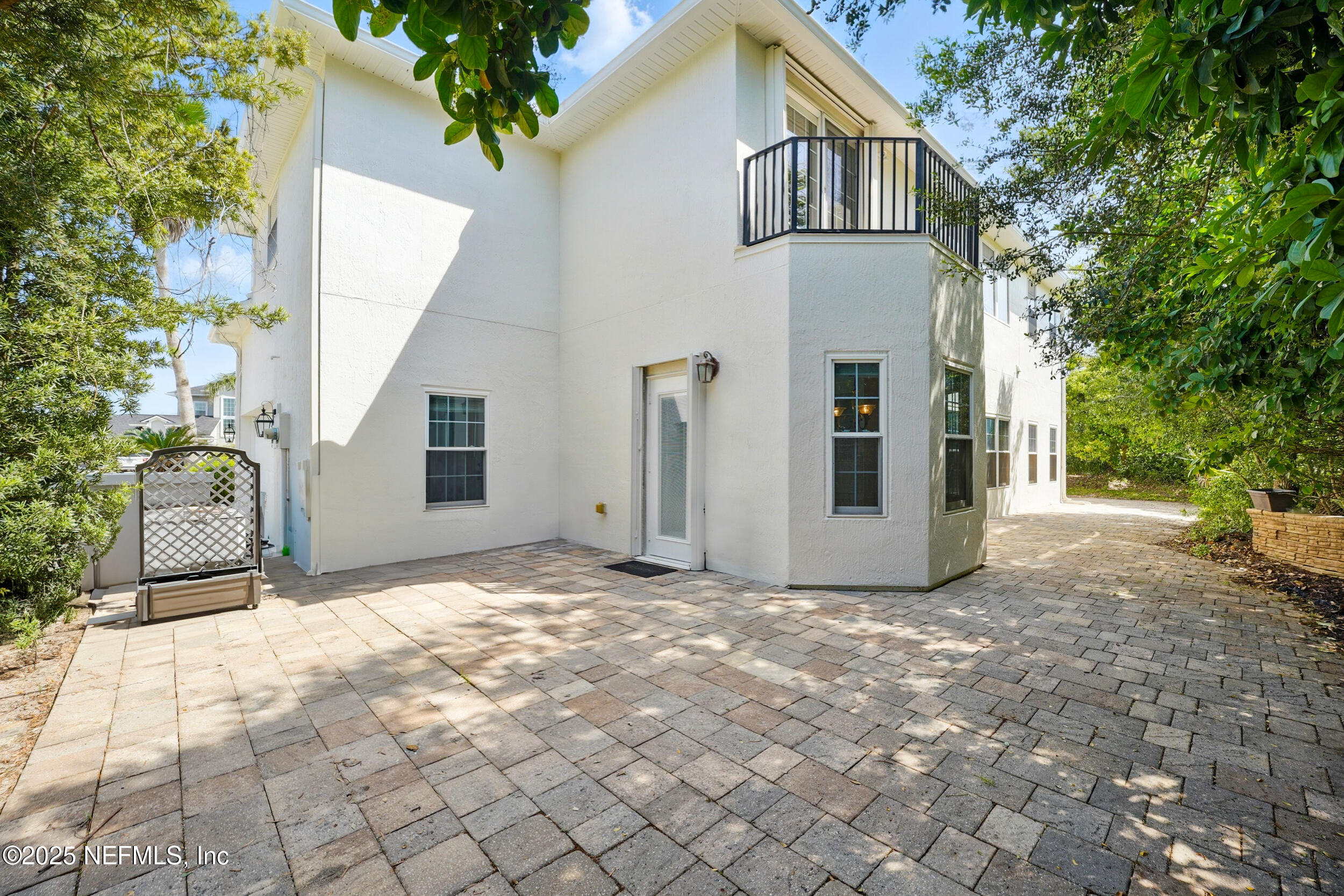 105 2nd Street St. Augustine, FL 32084 - Photo 48 of 61 a view of a house with a yard