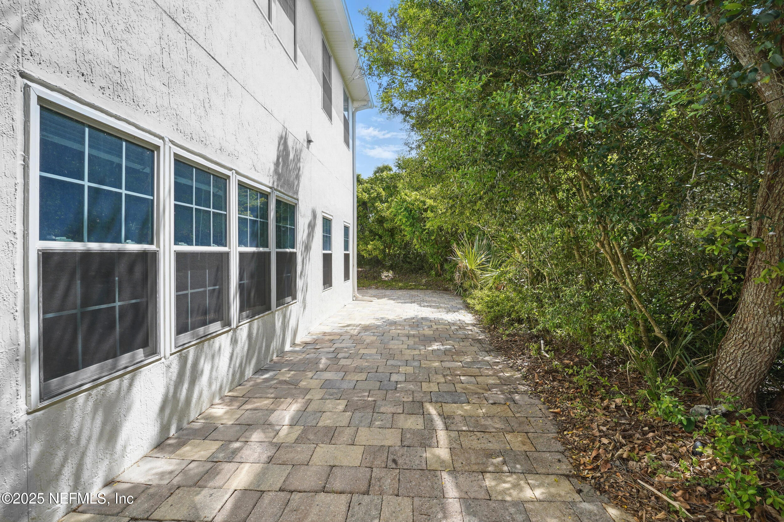 105 2nd Street St. Augustine, FL 32084 - Photo 49 of 61 a view of a house with a yard