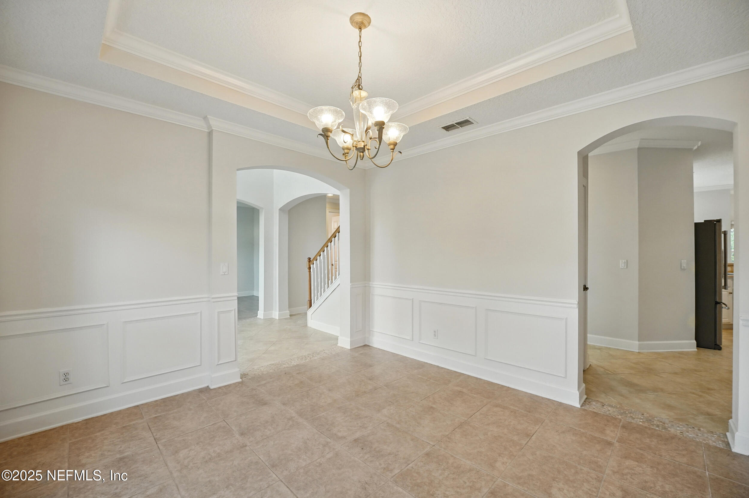 105 2nd Street St. Augustine, FL 32084 - Photo 9 of 61 a view of a chandelier in big room and chandelier