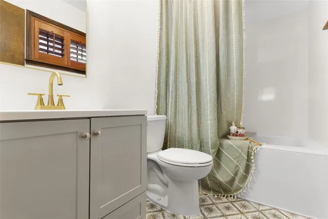 a view of a chairs and table in the patio