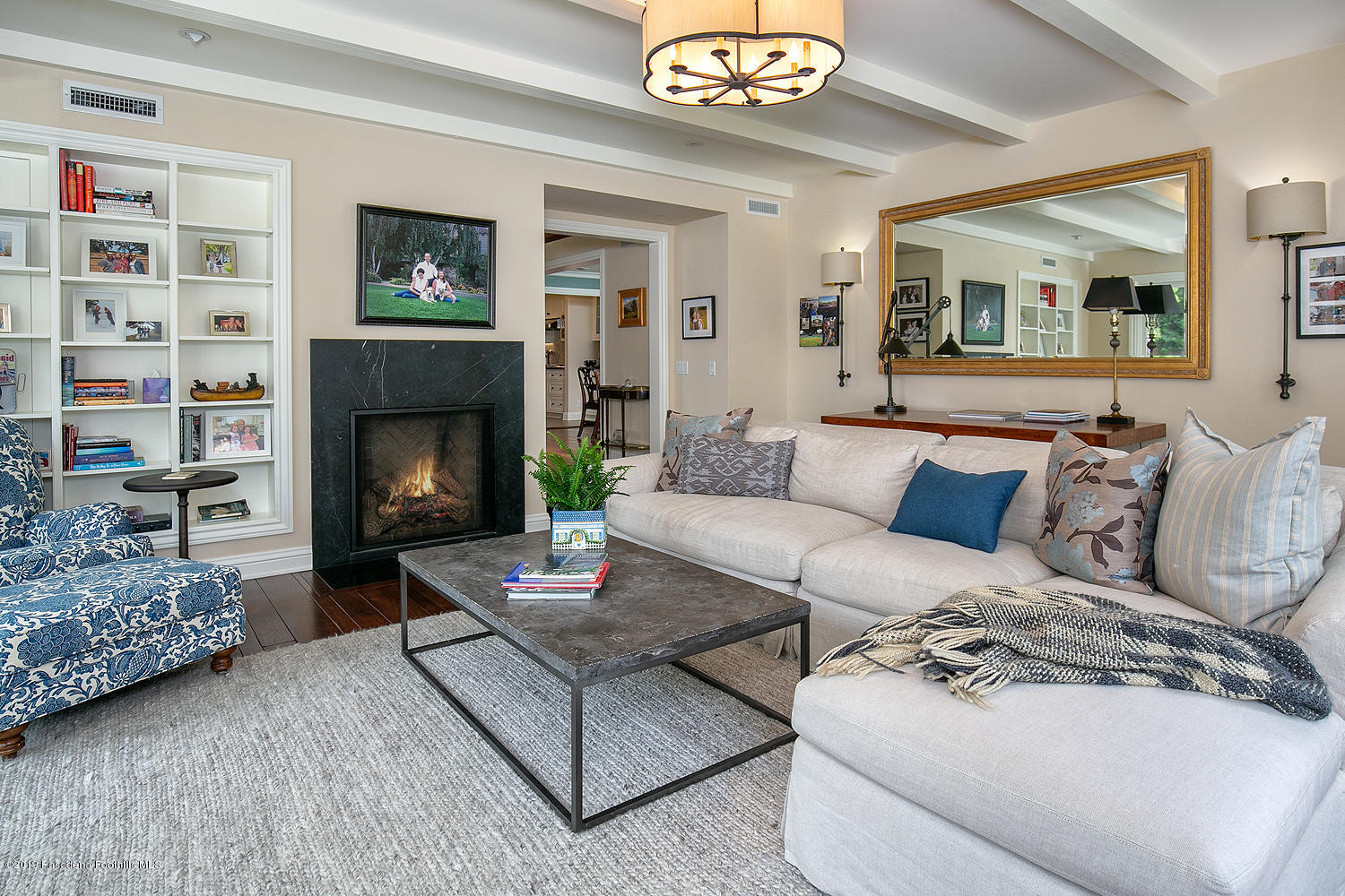504 Arbor Street Pasadena, CA 91105 - Photo 15 of 46 a living room with furniture and a fireplace