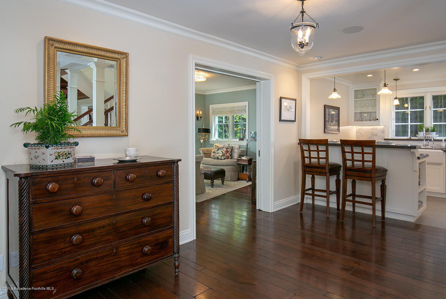 504 Arbor Street Pasadena, CA 91105 - Photo 19 of 46 a view of a dining room with furniture and wooden floor