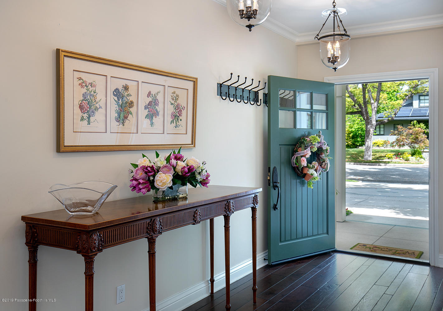 504 Arbor Street Pasadena, CA 91105 - Photo 3 of 46 a view of a dining room with wooden floor and a window